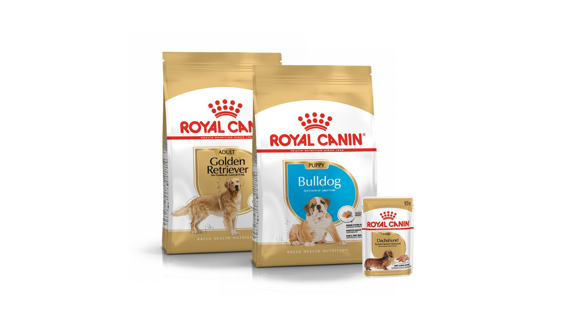 Ein Produktfoto von drei Beuteln mit unterschiedlichen ROYAL CANIN Nahrungen für reinrassige Hunde